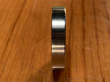 EXTSW 14.57 mm ID x 27.35 mm OD x 5.5 mm thick 316 stainless washer.